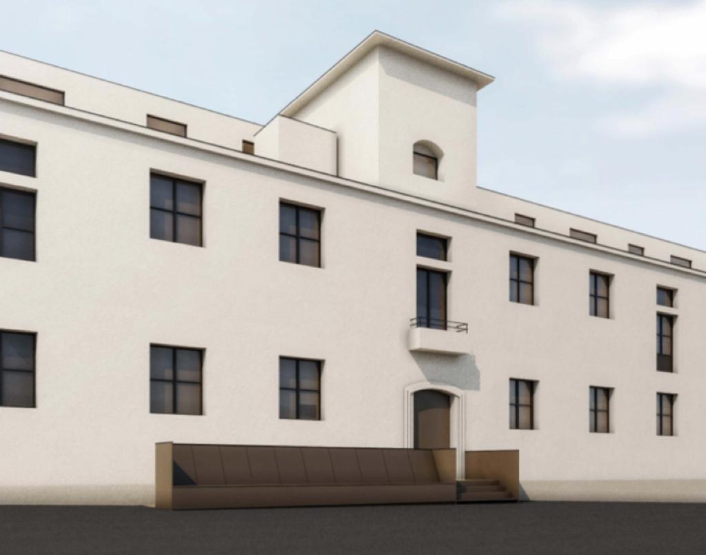 Facciata di un edificio moderno in stile semplice, con pareti bianche e finestre rettangolari.